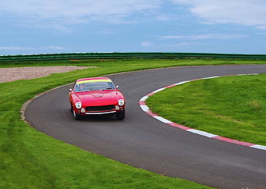 Red vintage car on a race track