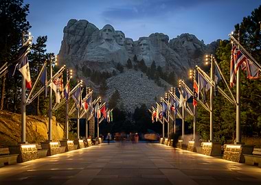 Mount Rushmore at Dusk with Flags