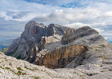 Majestic Mountain Peaks Under Cloudy Sky - Cima Rosetta
