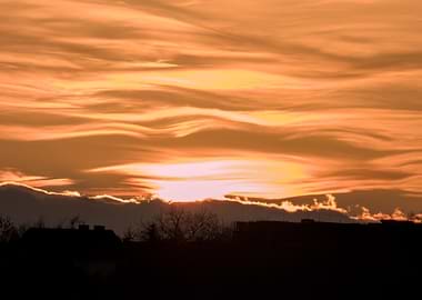 Sunset Over Silhouetted Buildings