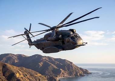 Military Helicopter Over Coastal Mountains