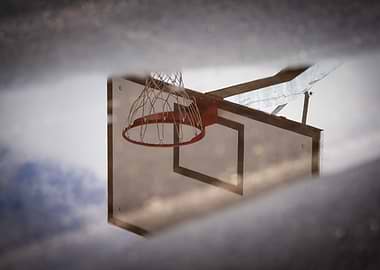 Basketball hoop reflection in puddle