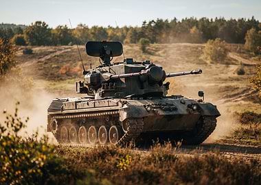 Tank driving through dusty terrain
