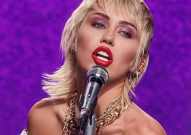 Miley Cyrus Singing with Microphone