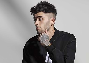 Zayn Malik posing in a black jacket