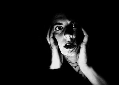 Scared person in darkness