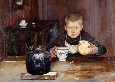 Boy eating bread and drinking tea