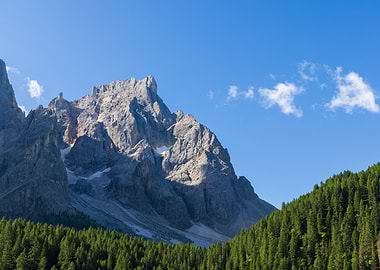 Majestic Mountain Peaks Under Blue Sky - Val Venegia