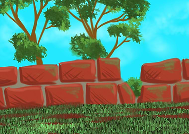 Brick wall with trees and grass