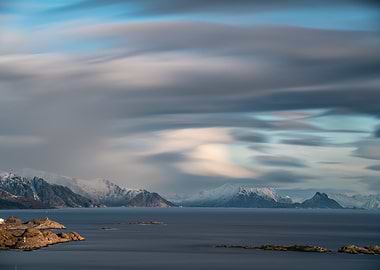 Long Exposure of Snowy Mountains and Sea