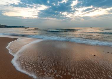 Sunrise over a tranquil beach