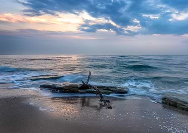 a Rocky Beach at Sunset