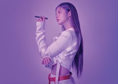 Sullyoon nmixx in white outfit holding a pen