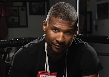 Usher in boxing ring