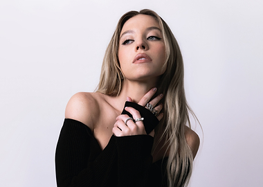 Sydney Sweeney Poses in Black Top