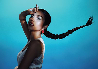 olivia rodrigo with Braid and Blue Background