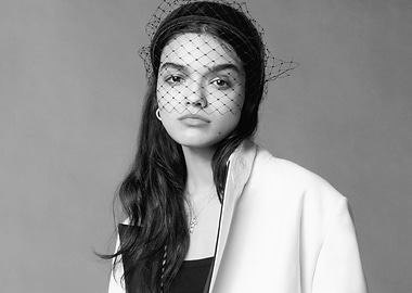 rachel zegler in Veil and Blazer