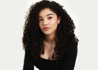 malia baker with Curly Hair