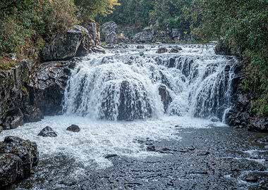 Cascading Waterfall Over Rocks