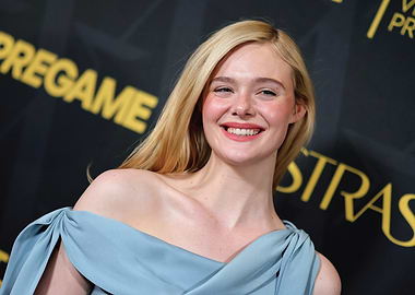 Elle Fanning smiles on the red carpet