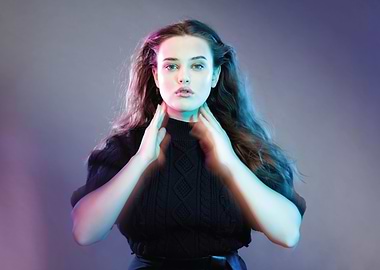 Katherine Langford in Black Sweater with Colorful Lighting