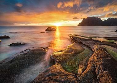 Sunset Over Rocky Coastline