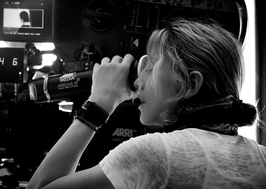 Filmmaker operating camera