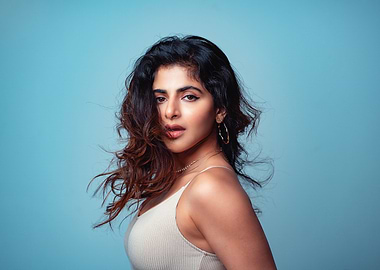 iswarya menon with Wavy Hair and Hoop Earrings