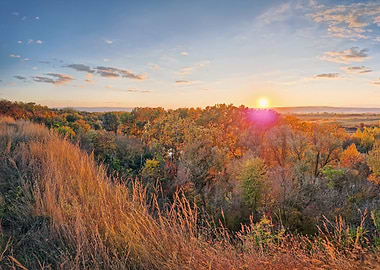 Autumn Sunset Over Forested Hills