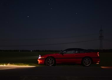 Red Sports Car at Night