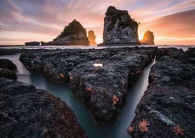 Coastal Rocks and Sea Stacks at Sunset