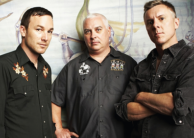 toadies Three men posing for a photo