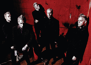 stahlmann Band Posing Against Red Wall