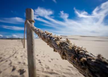 Rope fence on a sandy beach