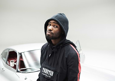 Man in Hoodie Poses by Classic Car santan dave