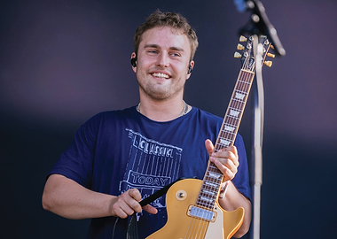 Musician with Guitar on Stage Sam Fender