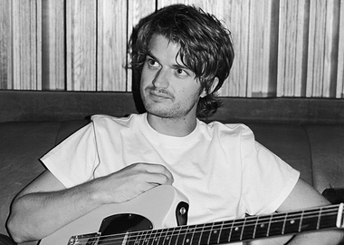 djo joe keery with Guitar in Studio