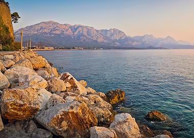Rocky Coastline with Mountains and Sea