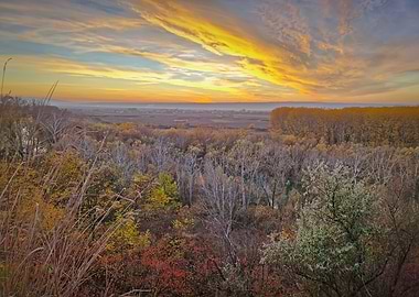Autumn Sunset Over Forest and Fields