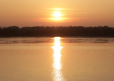 Sunset over a calm river