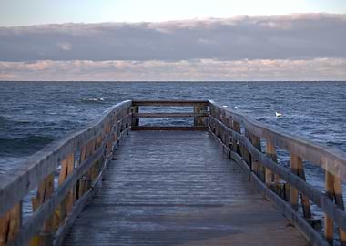 Wooden pier extending into the sea