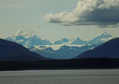 Majestic Snow-Capped Mountains Over Water