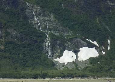 Mountain Waterfall with Snow Patches
