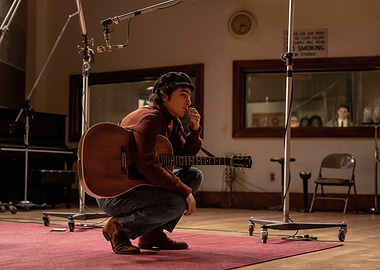 Musician in Recording Studio with Guitar