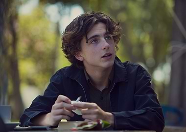 Young man looking up outdoors
