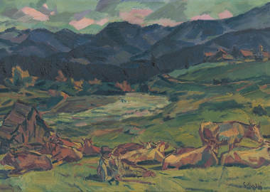 Cows Grazing in a Mountain Landscape