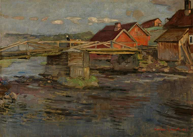 Bridge over a river with red houses