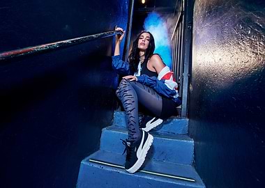 Woman in athletic wear on stairs