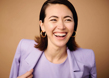 jessica henwick in purple blazer laughing