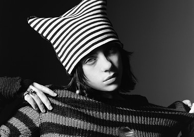 Billie Eilish in Striped Hat and Sweater